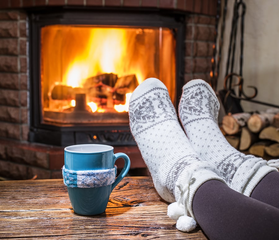 Warming and relaxing near fire 148655708