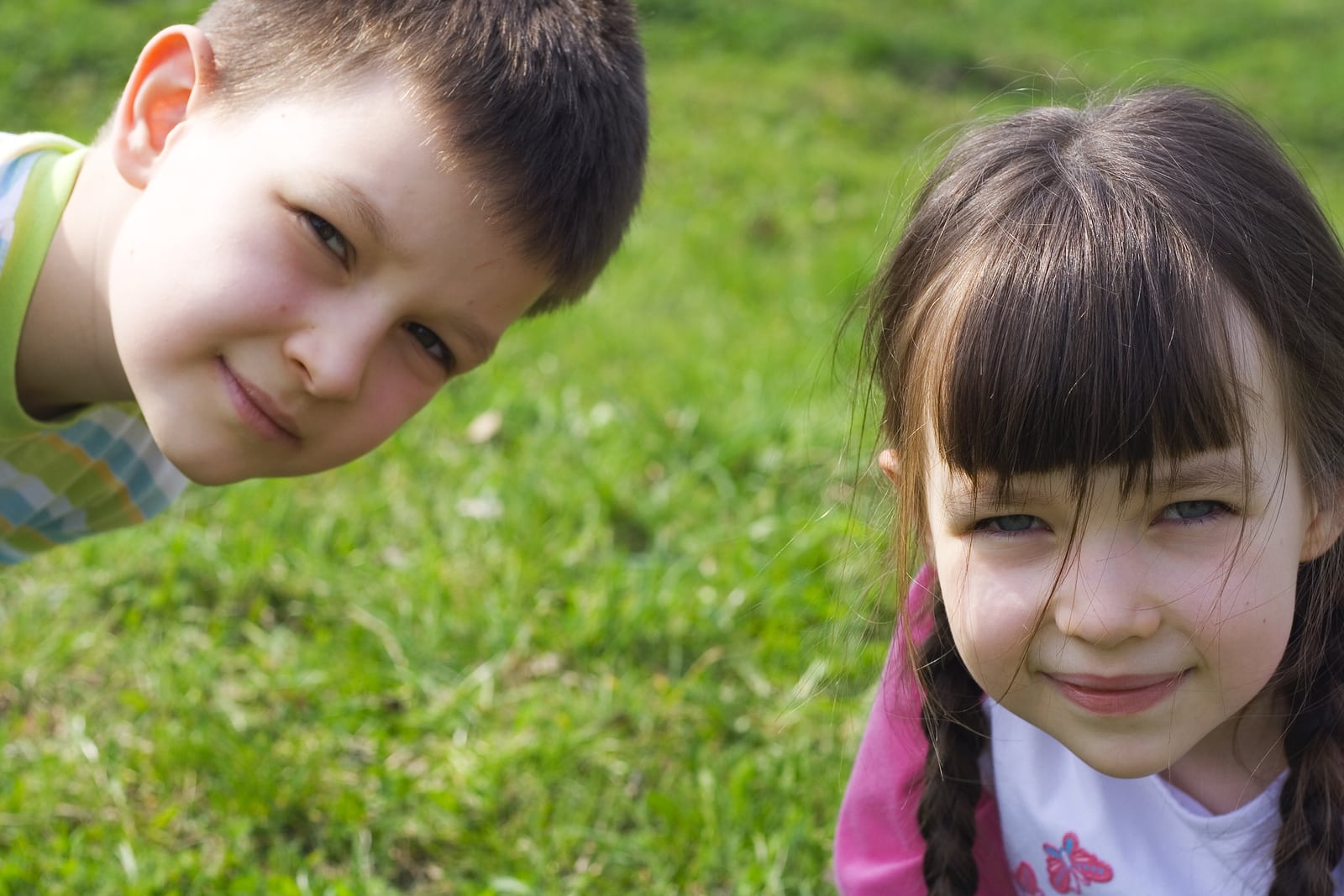 bigstockphoto_Children_On_Grass_521946